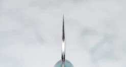 Nigara Santoku SG2 Migaki Tsuchime Green-Turquoise 180mm (7.1") 5 Nigara Santoku SG2 Migaki Tsuchime Green-Turquoise 180mm (7.1") -Sharp Edge Shop NigaraSantokuSG2MigakiTsuchimeTurquoise180mm 420108101625 3